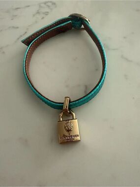 Kurt Geiger London Turquoise Leather Bracelet with Gold Padlock Charm